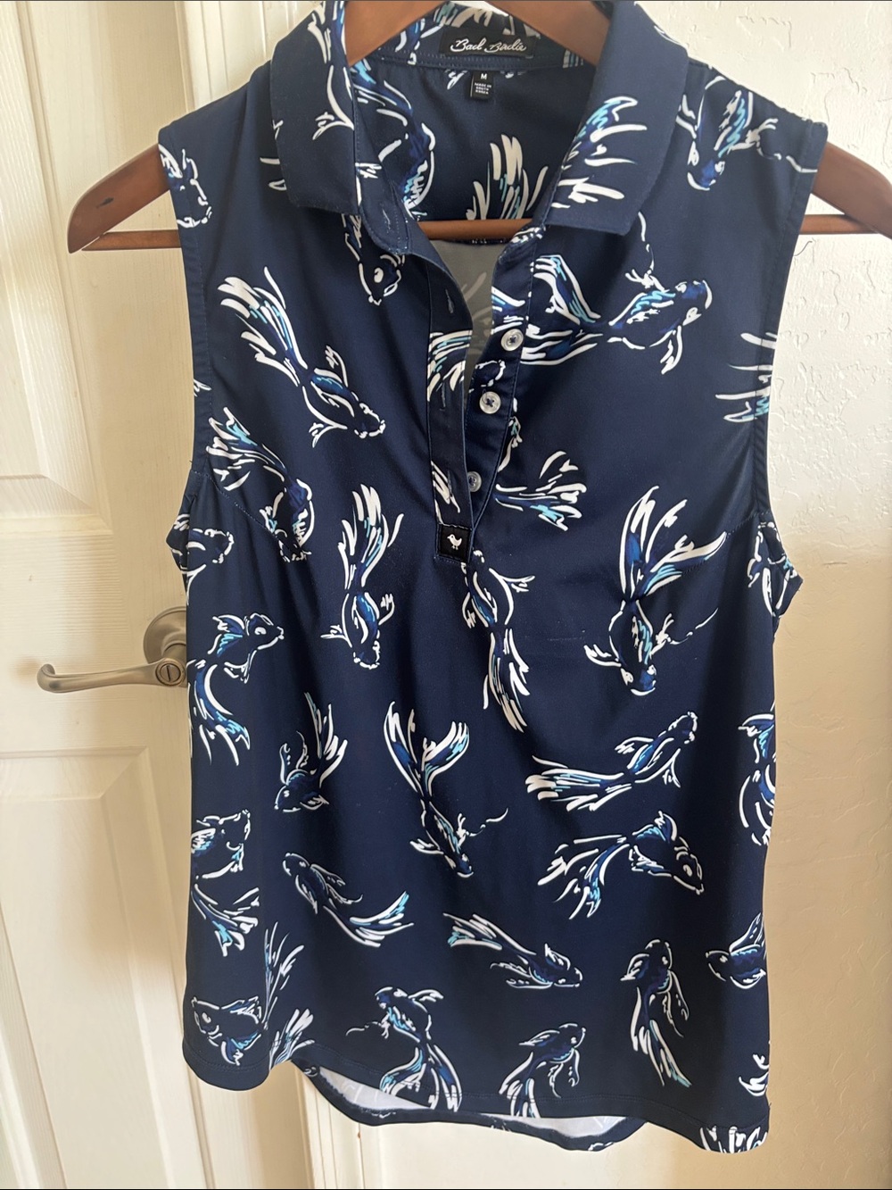 Bad Birdie Navy Sleeveless Polo with White and Light Blue Bird Print